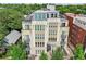 Stunning top-down shot of building showcasing balconies and beautiful neighborhood at 340 S Lafayette St # 204, Denver, CO 80209