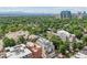 Multi-story residential building surrounded by lush trees, providing serene views and a sense of privacy, located in the city at 340 S Lafayette St # 204, Denver, CO 80209