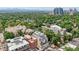 Multi-story residential building surrounded by lush trees, providing serene views and a sense of privacy, located in the city at 340 S Lafayette St # 204, Denver, CO 80209