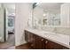 Bright bathroom showcases double sinks, mosaic tile accents, and neutral decor at 340 S Lafayette St # 204, Denver, CO 80209
