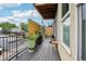 Private deck with potted plants, wood railings, and a relaxed atmosphere at 340 S Lafayette St # 204, Denver, CO 80209
