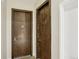 Hallway with two stained wood doors, numbered 204 and 206 at 340 S Lafayette St # 204, Denver, CO 80209