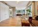Spacious interior view featuring hardwood floors, white trim and modern kitchen at 340 S Lafayette St # 204, Denver, CO 80209