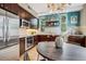 Contemporary kitchen features stainless steel appliances, custom cabinets, and decorative backsplash at 340 S Lafayette St # 204, Denver, CO 80209