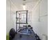 Basement home gym featuring exercise equipment, weights, and plenty of space for activities at 2330 Yarrow St, Lakewood, CO 80214