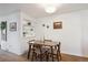 Charming dining area with a view of the kitchen, featuring a classic table setting at 2330 Yarrow St, Lakewood, CO 80214