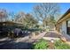 Extensive backyard garden space with multiple raised garden beds ready for planting at 2330 Yarrow St, Lakewood, CO 80214