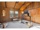 Cozy office area with wood paneled walls, large windows, and a comfortable work space at 2330 Yarrow St, Lakewood, CO 80214