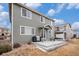 Angle view of the home's backyard, showcasing the patio, grill, and overall yard space at 1432 Red Mica Way, Monument, CO 80132