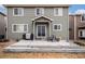 View of the backyard featuring a small patio and a covered grill at 1432 Red Mica Way, Monument, CO 80132