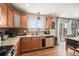 Well-equipped kitchen with stainless steel appliances, granite countertops, and ample cabinet space at 1432 Red Mica Way, Monument, CO 80132