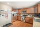 Well-equipped kitchen with stainless steel appliances, granite countertops, and ample cabinet space at 1432 Red Mica Way, Monument, CO 80132