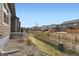 Fenced backyard with minimal maintenance landscaping and plenty of privacy at 6712 Sea Oats Dr, Parker, CO 80138