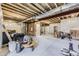 Unfinished basement with exposed beams and ample space for storage or future development at 6712 Sea Oats Dr, Parker, CO 80138