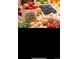 Various fresh local produce, like potatoes, eggs, strawberries, garlic, tomatoes, and blueberries at 6712 Sea Oats Dr, Parker, CO 80138
