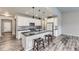 Modern kitchen boasts sleek granite countertops and stainless steel appliances at 6712 Sea Oats Dr, Parker, CO 80138