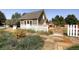 Quaint shed with a white picket fence and stone pathway at 6712 Sea Oats Dr, Parker, CO 80138