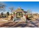 Town gazebo with holiday decorations and lights, in a well maintained park at 6712 Sea Oats Dr, Parker, CO 80138