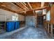 Interior view of the garage with an unfinished ceiling and walls at 1900 Kingston St, Aurora, CO 80010
