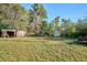 A spacious backyard with storage sheds and mature trees offers plenty of possibilities at 7735 Westview Dr, Lakewood, CO 80214