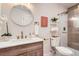Updated bathroom featuring a vanity with a vessel sink, stylish fixtures, and a glass enclosed shower at 10472 Lincoln Ct, Northglenn, CO 80233