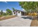 The exterior features modern gray paint and the property also offers a large, freshly paved driveway at 10472 Lincoln Ct, Northglenn, CO 80233