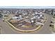 Aerial view of the neighborhood, showcasing a home with backyard, pergola, and in-ground pool at 6614 S Vandriver Way, Aurora, CO 80016