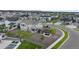 Aerial view of a home that features a manicured lawn, patio, and landscaping at 6614 S Vandriver Way, Aurora, CO 80016