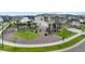 Manicured backyard with an outdoor patio area, fire pit, and nice landscaping at 6614 S Vandriver Way, Aurora, CO 80016