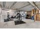 Spacious basement home gym with weightlifting equipment and ample room for a complete workout setup at 6614 S Vandriver Way, Aurora, CO 80016
