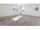 Bright bedroom with plush carpet, ample natural light, and light painted walls at 4996 Hickory Oaks St, Castle Rock, CO 80104