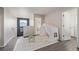 Second floor landing with a playful tent and access to several rooms of the home at 261 Mesa Ave, Lochbuie, CO 80603