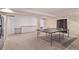 Finished basement with kitchenette and a ping pong table at 10345 Lions Heart, Lone Tree, CO 80124