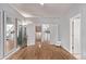 Bonus room features hardwood floors, multiple mirrors and abundant natural light, ideal for various activities at 10345 Lions Heart, Lone Tree, CO 80124