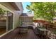 Outdoor deck with comfortable seating and a fire pit at 10345 Lions Heart, Lone Tree, CO 80124