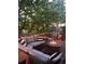 Deck with an outdoor sectional couch and a fire pit at 10345 Lions Heart, Lone Tree, CO 80124