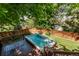 Wooden hot tub on backyard deck with landscaped yard and privacy fence at 10345 Lions Heart, Lone Tree, CO 80124