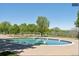 Community pool view with seating area at 10345 Lions Heart, Lone Tree, CO 80124