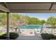 View of a large community pool and seating area at 10345 Lions Heart, Lone Tree, CO 80124