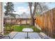 The private backyard features a charming patio and well-kept lawn at 1529 S Sable Blvd # C, Aurora, CO 80012