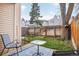 Cozy backyard patio with blue rug and seating area at 1529 S Sable Blvd # C, Aurora, CO 80012