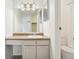 Bright bathroom features a vanity with ample lighting and a walk-in shower at 1529 S Sable Blvd # C, Aurora, CO 80012