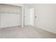 Bedroom with neutral carpet and a view of an open closet at 1529 S Sable Blvd # C, Aurora, CO 80012