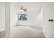 Bedroom with neutral carpeting, a ceiling fan and natural light from the window at 1529 S Sable Blvd # C, Aurora, CO 80012