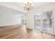 Bright dining area with wood flooring and access to the private backyard at 1529 S Sable Blvd # C, Aurora, CO 80012