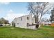 A view of the rear exterior of the townhome on a sunny day at 1529 S Sable Blvd # C, Aurora, CO 80012