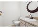 Cozy half bathroom with large mirror and decorative features at 1529 S Sable Blvd # C, Aurora, CO 80012