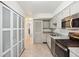 Efficient kitchen featuring stainless steel appliances and modern cabinets at 1529 S Sable Blvd # C, Aurora, CO 80012