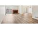 Bright living room featuring a fireplace and sliding doors to a private patio at 1529 S Sable Blvd # C, Aurora, CO 80012