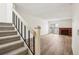 Living room with stairs and a fireplace at 1529 S Sable Blvd # C, Aurora, CO 80012